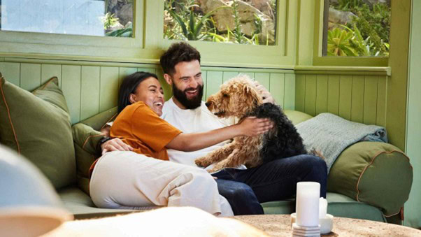 Illustration of pet parenthood in a childfree couple’s lifestyle. Image by Goodboy Picture Company / Getty Images